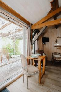 Chalets Le Cabanon dore* Suite SPA et nature : photos des chambres