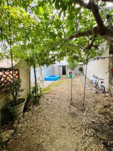 Maisons de vacances Haut de villa avec coin jardin et cuisine d'ete : photos des chambres