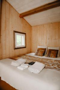 Chalets Le Cabanon dore* Suite SPA et nature : photos des chambres