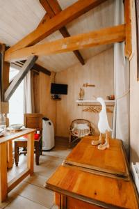 Chalets Le Cabanon dore* Suite SPA et nature : photos des chambres