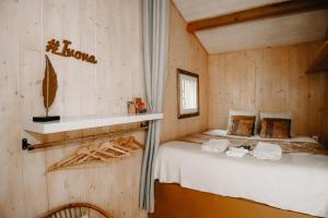 Chalets Le Cabanon dore* Suite SPA et nature : photos des chambres