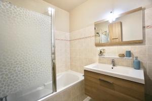 Appartements L'Atoll *hyper centre*Parking* : photos des chambres