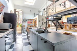 Maisons de vacances Loft Arvor - Charmant loft avec jardin : photos des chambres