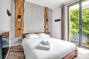 Maisons de vacances Cosy Lodge - Charmant lodge en plein coeur de Dinan : photos des chambres