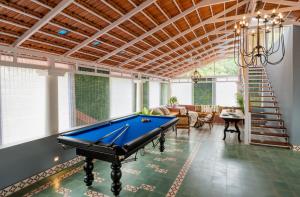 ELIVAAS Signature 5 BHK with Pvt Pool, Entertainment Room & Glass House - Bludoor