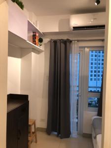 Unit 1005 Tower B Cool Suites at Wind Residences