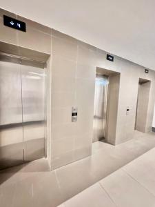 Aesthetic One Bedroom Beside SM w Pool, Wifi and Netflix