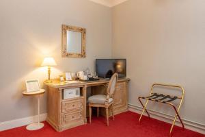 Hotels Grand Hotel Des Templiers : photos des chambres