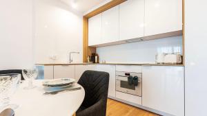 VacationClub – WHITEblue Apartament 72