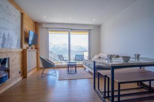 Appartements Cosy and modern studio with view - Huez - Welkeys : photos des chambres