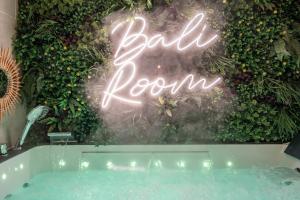 Appartements BALI ROOM / Magnifique studio evasion JACCUZI : photos des chambres