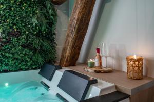 Appartements BALI ROOM / Magnifique studio evasion JACCUZI : photos des chambres