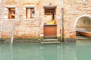Dreams door with canal view in Venice