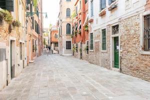 Dreams door with canal view in Venice