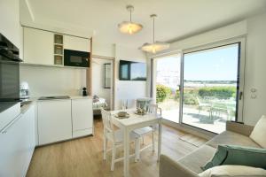 Appartements Rose des sables * front de mer* : photos des chambres