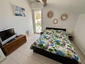 Villas La Villa Louca - Charme, Soleil & Detente aux Portes des Landes : photos des chambres