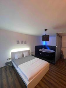 Appartements Grand Studio avec Jacuzzi : photos des chambres