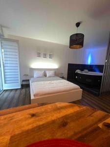 Appartements Grand Studio avec Jacuzzi : photos des chambres