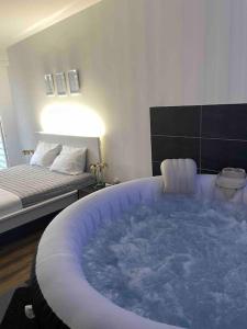 Appartements Grand Studio avec Jacuzzi : photos des chambres