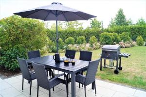 Modernes, großzügiges Ferienhaus - Naturstrand, großer Garten, Ruhe