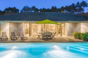 Villas Villa 10 personnes avec piscine privee chauffee entre foret, golf et ocean - Moliets-et-Maa : photos des chambres