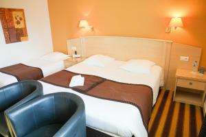 Hotels Logis L'Abreuvoir : photos des chambres