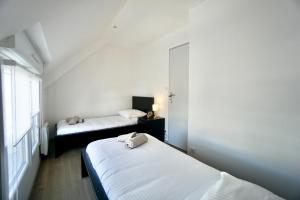 Appartements Cabine de plage n°2 *50m de la plage* : photos des chambres