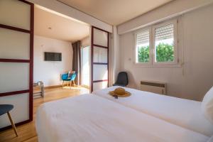 Appart'hotels CERISE Dax - Les Jardins du Lac : photos des chambres