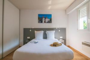 Appart'hotels CERISE Dax - Les Jardins du Lac : photos des chambres