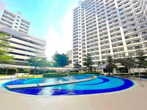 1 Bedroom with Balcony Pool View and WiFi in Grace Residences