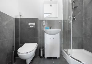 Wola Comfort Studio #3 by BookingHost