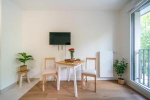 Appartements Sensations - Studio dans le quartier daffaires : photos des chambres