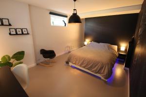 Appartements Bienvenue chez DaLo, jacuzzi, art et modernite : photos des chambres