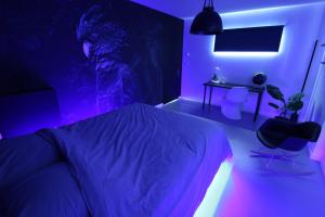 Appartements Bienvenue chez DaLo, jacuzzi, art et modernite : photos des chambres