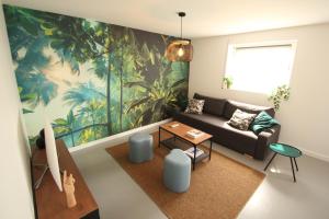 Appartements Bienvenue chez DaLo, jacuzzi, art et modernite : photos des chambres