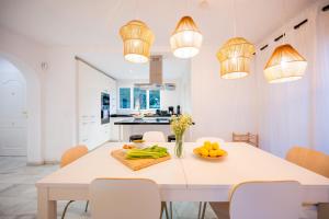 Typical beach house Las Chapas Playa with heated pool