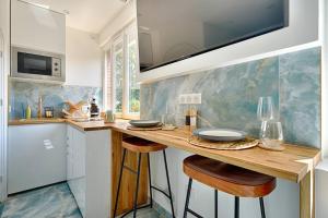 Appartements welcome to Santorini : photos des chambres