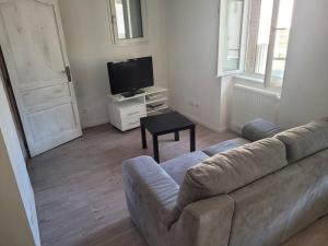 Appartements Logement avec grand balcon dans le Brionnais : photos des chambres