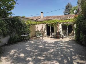 Appartements l'Atelier Des Garrigues, havre de fraicheur : photos des chambres