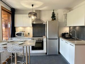 Les Gets - Appartement rénové 3 étoiles, face aux pistes, balcon et parking - FR-1-623-294