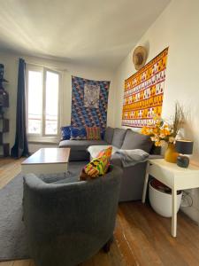 SUPER APPARTEMENT AU COEUR DE MONTMARTRE