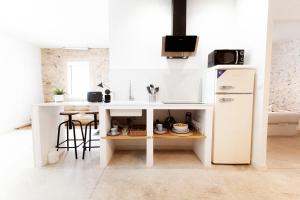 Apt estilo industrial en la playa Alguer