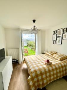 Appartements Appartement avec jardin pres de Disneyland : photos des chambres