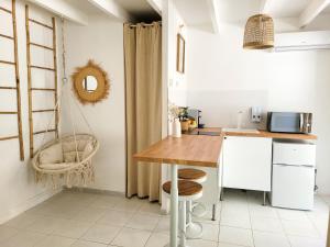 Appartements Studio double climatise avec terrasse - Proche Tram & Centre : photos des chambres