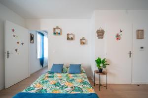 Appartements Tropicana - Appt avec terrasse et parking : photos des chambres