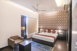 FabHotel Rivlet Residency