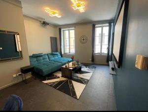 Appartements Escapade Urbaine - Balneotherapie - Cinema au Coeur de la Ville : photos des chambres