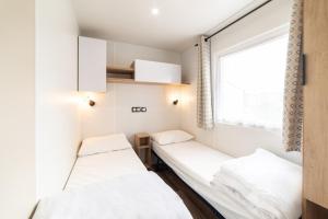 Appartements Mobil-home Bora Bora : photos des chambres