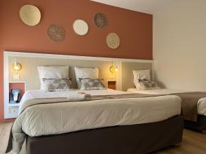 Hotels Logis L'Espadon : photos des chambres