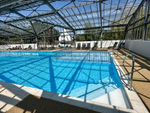 Maisons de vacances Le COTTAGE Baulois-Entre MER et NATURE- Plages- Tout a velo ou a pied- PISCINE couverte : photos des chambres